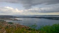 Panoramic image of the bay with tiled roofs, picturesque mountains and the bay. Croatia.