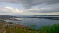 Panoramic image of the bay with tiled roofs, picturesque mountains and the bay. Croatia