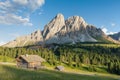 Panoramic image of Italian Dolomites with famous peaks and chalets, South Tyrol, Italy, Europe at summer sunset. Awesome