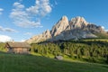 Panoramic image of Italian Dolomites with famous peaks and chalets, South Tyrol, Italy, Europe at summer sunset. Awesome