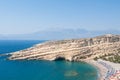 Panoramic image of Matala caves and Matala beach on the Crete island, Greece. Royalty Free Stock Photo