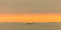 Panoramic image of a sailing boat at the Dutch Markermeer