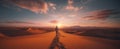 Panoramic image of a traveller man walking in the desert among the sand dunes at sunset. Gorgeous fantasy scene Royalty Free Stock Photo