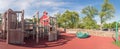 Panoramic kid wooden playground recreation area at American public park Royalty Free Stock Photo