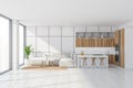 Panoramic kitchen space with sofa and bar stools, white Royalty Free Stock Photo