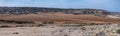 Panoramic landscape with asphalt road through hills in Cape Greco, Cyprus Royalty Free Stock Photo