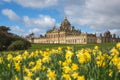 Panoramic landscape of Castle Howard Stately Home with daffodils at Springtime