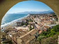 Panoramic landscape of the city and the beach od Sperlonga at sunset. Aerial view. Italian coastline.