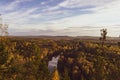 Panoramic landscape with forest lake in autumn day. Royalty Free Stock Photo