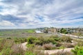 Panoramic landscape of Huntington Beach with road grass land pond and buildings Royalty Free Stock Photo