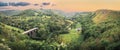 Panoramic landscape from Monsal Head looking down to the Monsal trail viaduct in Derbyshire Peak District