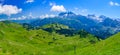 Panoramic landscape of mountains of Alps in summer with gondola lift in Portes du Soleil, Switzerland Royalty Free Stock Photo