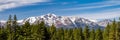 Panoramic landscape scene with snow capped mountains in Lake Tahoe California Royalty Free Stock Photo