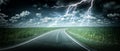 Panoramic landscape with thunderstorm over country road