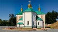 Landscape view of ancient Church of the Saviour at Berestovo. A portion of the wall cleaned from stucco belongs to the 12th cen.