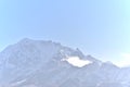 Panoramic landscape view of beautiful snowcapped Himalayan peaks on a hazy winter day in North Sikkim. It is famous for tourism in