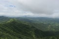 Panoramic landscape view of beautiful lush green Sahyadri mountains in monsoon season as seen from Sinhgad fort located in Pune, Royalty Free Stock Photo