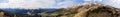 Panoramic landscape view, snow covered mountain peaks on mountain range. Royalty Free Stock Photo