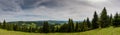 Panoramic landscape view from the top of the mountain on an overcasted day Royalty Free Stock Photo