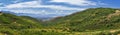 Panoramic Landscape view from Travers Mountain of Provo, Utah County, Utah Lake and Wasatch Front Rocky Mountains, and Cloudscape. Royalty Free Stock Photo