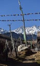 Panoramic landscape view of tibetan prayer flags raised in Lachen with snowcapped great Himalayas in the background in North Royalty Free Stock Photo