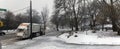 Panoramic of Macombs park and sanitation truck during snow fall