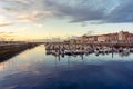 Panoramic marina with many small sailing boats docked on the shore of the city of Gijon, Asturias, Spain. Royalty Free Stock Photo