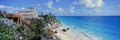 A Panoramic of Mayan ruins of Ruinas de Tulum (Tulum Ruins) and El Castillo at sunset, with beach and Caribbean Sea, in Quintana Royalty Free Stock Photo