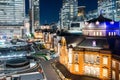 Panoramic modern city skyline bird eye aerial night view with tokyo station under dramatic glow and beautiful dark blue sky in To Royalty Free Stock Photo