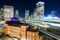 Panoramic modern city skyline bird eye aerial night view with tokyo station under dramatic glow and beautiful dark blue sky in To Royalty Free Stock Photo