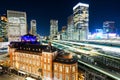 Panoramic modern city skyline bird eye aerial night view with tokyo station under dramatic glow and beautiful dark blue sky in To Royalty Free Stock Photo