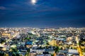 Panoramic modern city skyline bird eye aerial night view under dramatic neon glow and beautiful dark blue sky in Tokyo, Japan Royalty Free Stock Photo