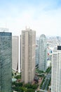 Panoramic modern city skyline bird eye aerial view with mode gakuen cocoon tower under dramatic sun and morning blue cloudy sky in Royalty Free Stock Photo