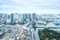 Panoramic modern city skyline bird eye aerial view of Odaiba bay and bridge under dramatic sunrise and morning blue cloudy sky in Royalty Free Stock Photo