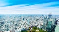 panoramic modern city skyline bird eye aerial view under dramatic sun and morning blue cloudy sky in Tokyo, Japan