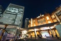 Panoramic modern cityscape building bird eye aerial night view of Tokyo Station under neon light and dark blue sky in Tokyo, Japan Royalty Free Stock Photo