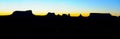 Panoramic Monument Valley sunrise silhouette, Navajo Nation Park