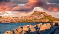 Panoramic morning cityscape of Castelsardo port. Amazing sunrise on Sardinia island