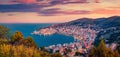 Panoramic morning cityscape of Saranda port. Great sunrise on Ionian sea. Royalty Free Stock Photo