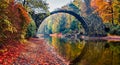 Panoramic morning scene of Azalea and Rhododendron Park Kromlau, Germany, Europe. Picturesque autumn panorama of Rakotz Bridge Ra