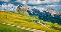 Panoramic morning view of Gardena Valley with Furchetta peak on background. Majestic summer scene of Puez Odle National Park, Dolo