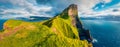 Panoramic morning view of Kallur Lighthouse, Kalsoy island. Splendid summer scene ofFaroe Islands, Kingdom of Denmark, Europe. Fan Royalty Free Stock Photo