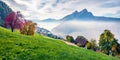 Panoramic morning view of outskirts of Stansstad town, Switzerland, Europe. Foggy autumn scene of Lucerne lake. Attractive lands