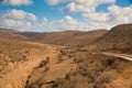 Panoramic Moroccan landscape with hills and cactuses Royalty Free Stock Photo