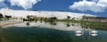 Panoramic mountain lake and loving swans