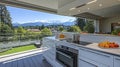Panoramic mountain view kitchen with outdoor access Royalty Free Stock Photo
