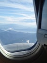 Panoramic mountain view from the plane window Royalty Free Stock Photo