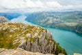 Panoramic mountain view to the long narrow and blue Lysefjord, Prekestolen hiking trail, Forsand, Rogaland county, Norway