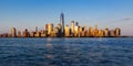 Panoramic of New York City Financial District skyscrapers at sunset Royalty Free Stock Photo