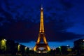 Panoramic night view on the Eiffel Tower in Paris, France